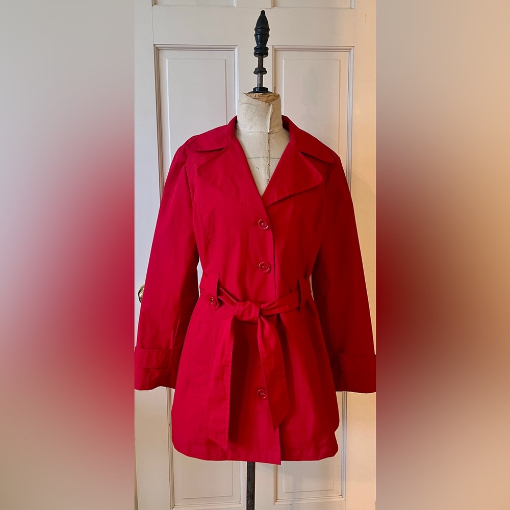 Red raincoat with belt